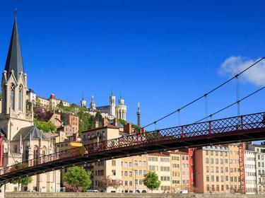 A photo of Lyon, France showing buildings and a bridge