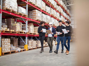 CET team tours warehouse facility