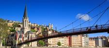 A photo of Lyon, France showing buildings and a bridge